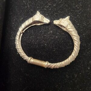 Double Wolf Head Spring Gladiator Silver tone Bangle